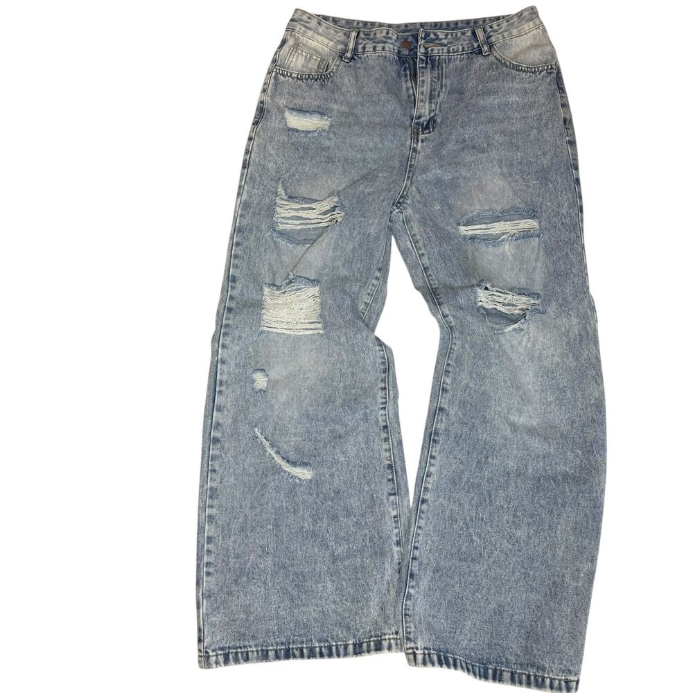 Distressed blue Denim jeans with a baggy fit. Size XL
